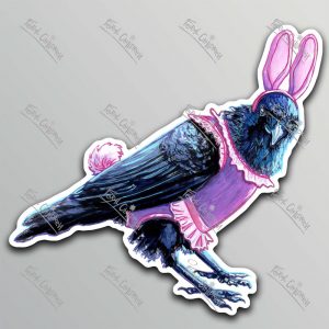 A sticker of an illustration of a crow wearing a pink bunny costume complete with ears and tail and a ballet tutu.